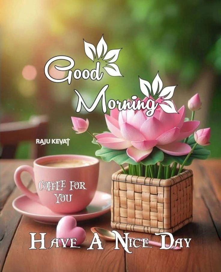This may contain a cup of coffee and some pink flowers on a table with the words good morning have a nice day